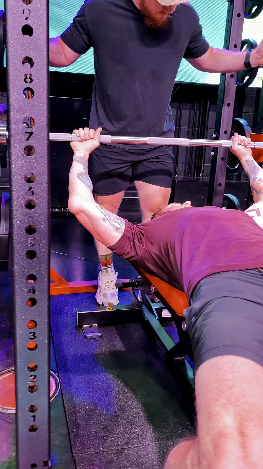 Barbell bench press with a spotter at the rack, Wabash Iron