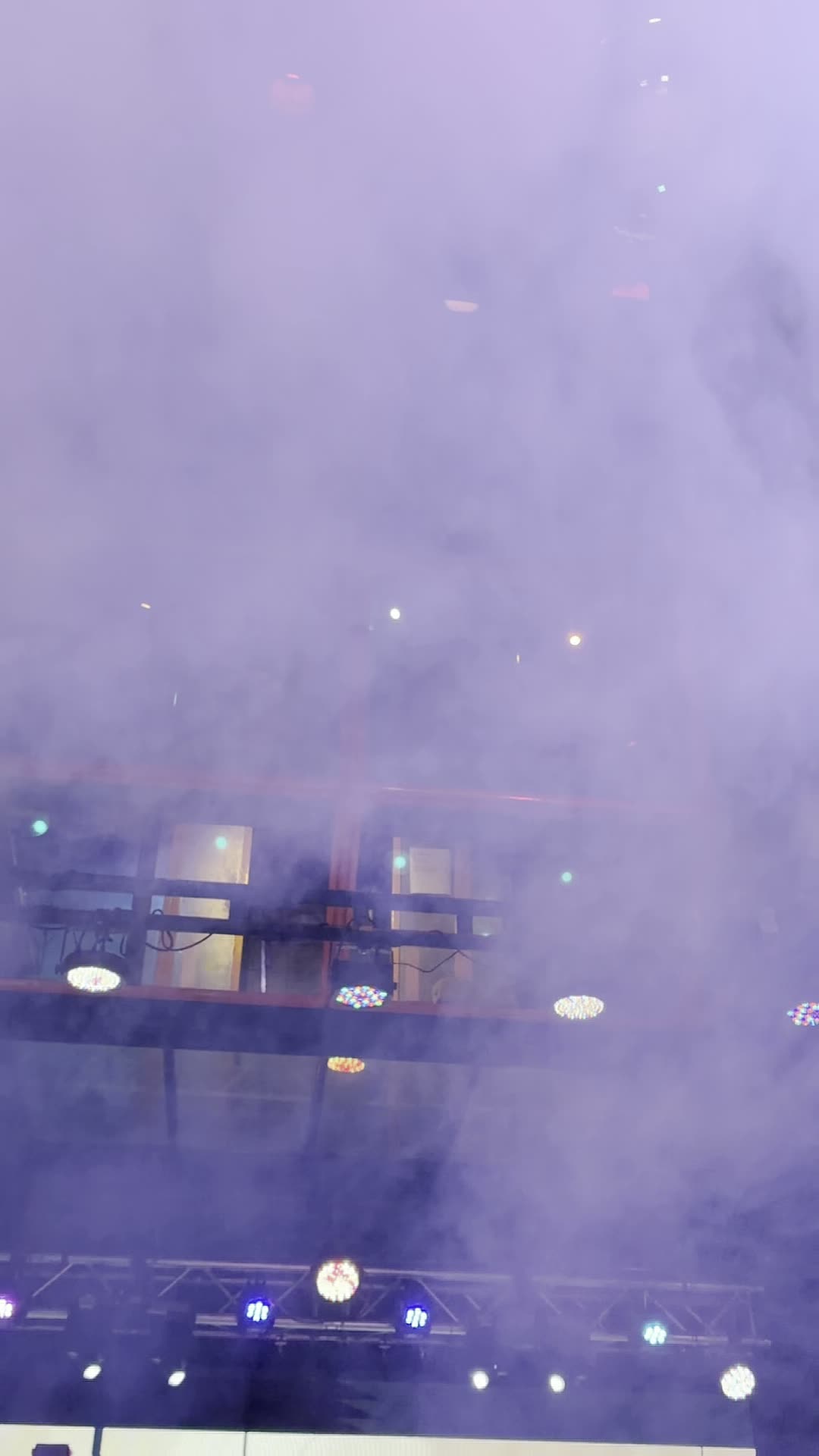 Haze filling the training floor at Wabash Iron, equipment silhouetted in purple light