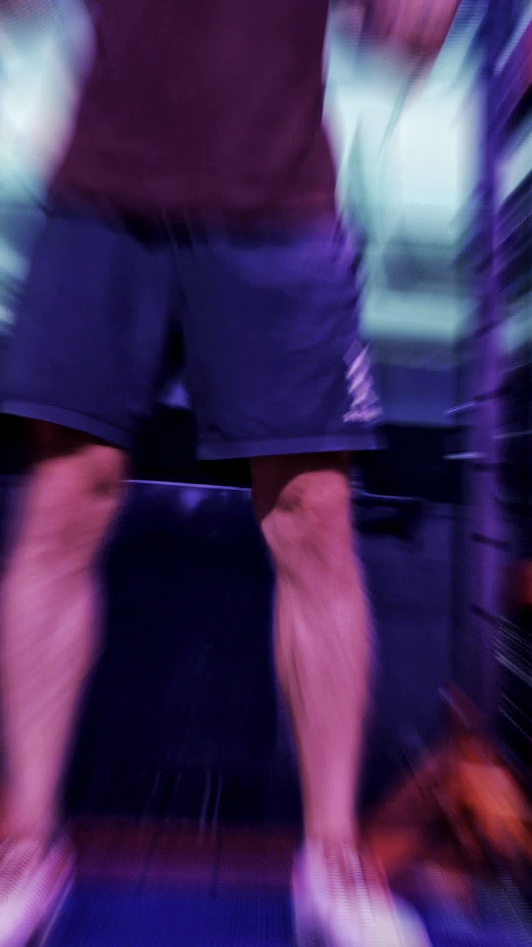 Lifter setting up for a barbell back squat in the rack at Wabash Iron